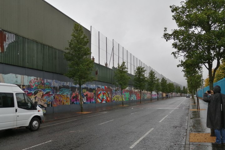 street of Belfast full of graffiti