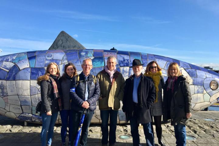 a group of people posing for a photo