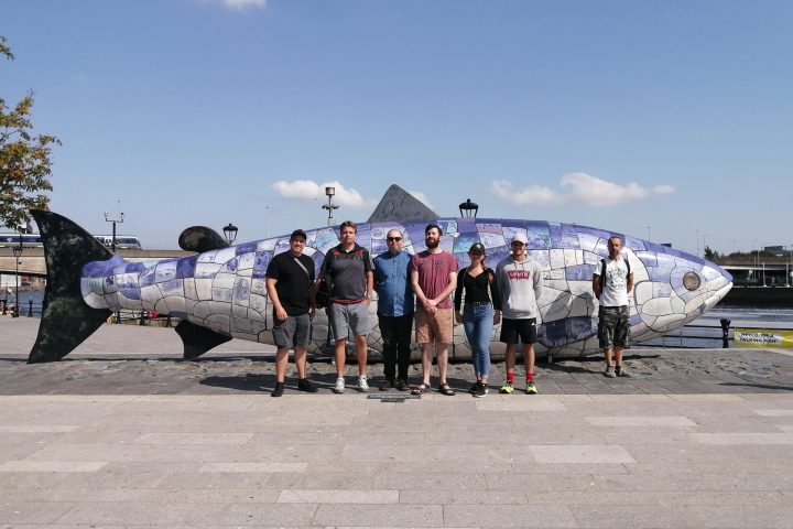 a group of people on a beach