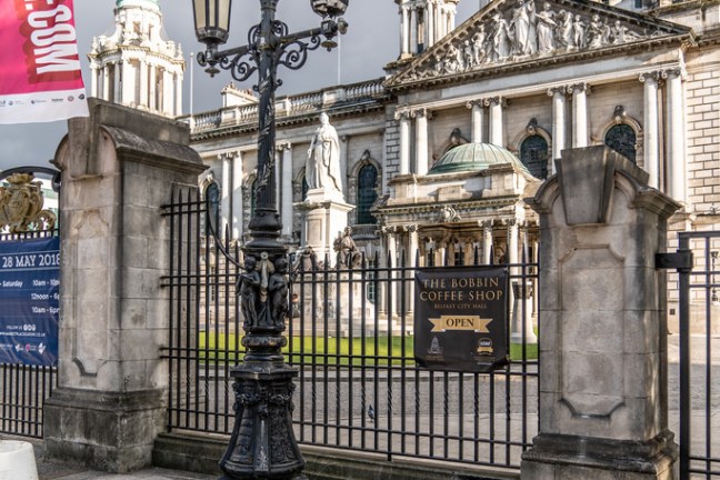 a statue in front of a building